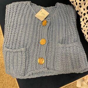 Popular Amazon, knit top with Gold buttons. Brand new!